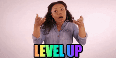 Gif: lady lifting hands to show "level up"